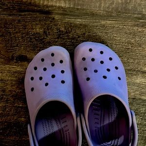 I’m selling shoes they are crocs size 2 the color is purple